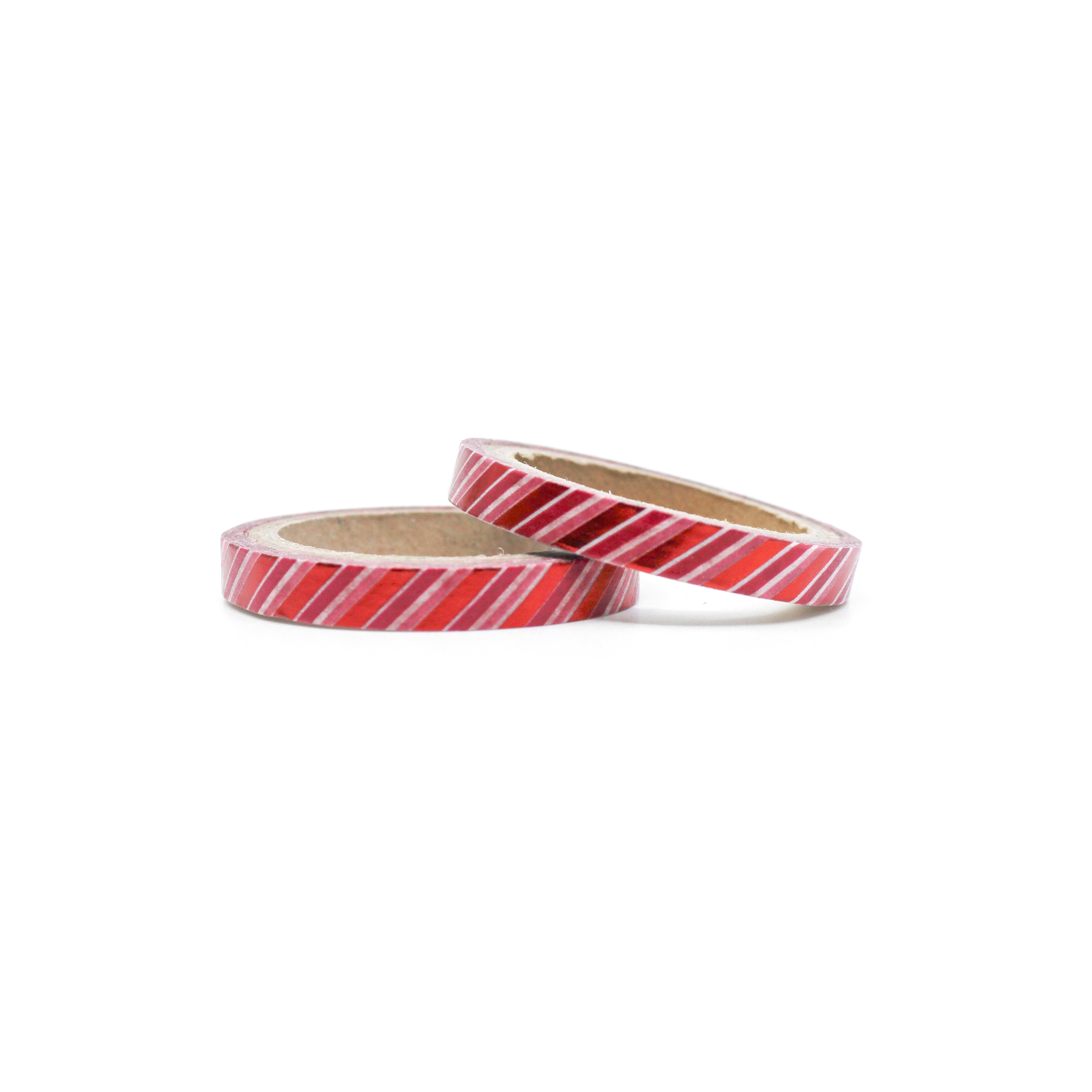 This is a roll of red and pink foil red stripe washi tapes that work for Christmas, Valentines, and Fourth Of July Holidays from BBB Supplies Craft Shop