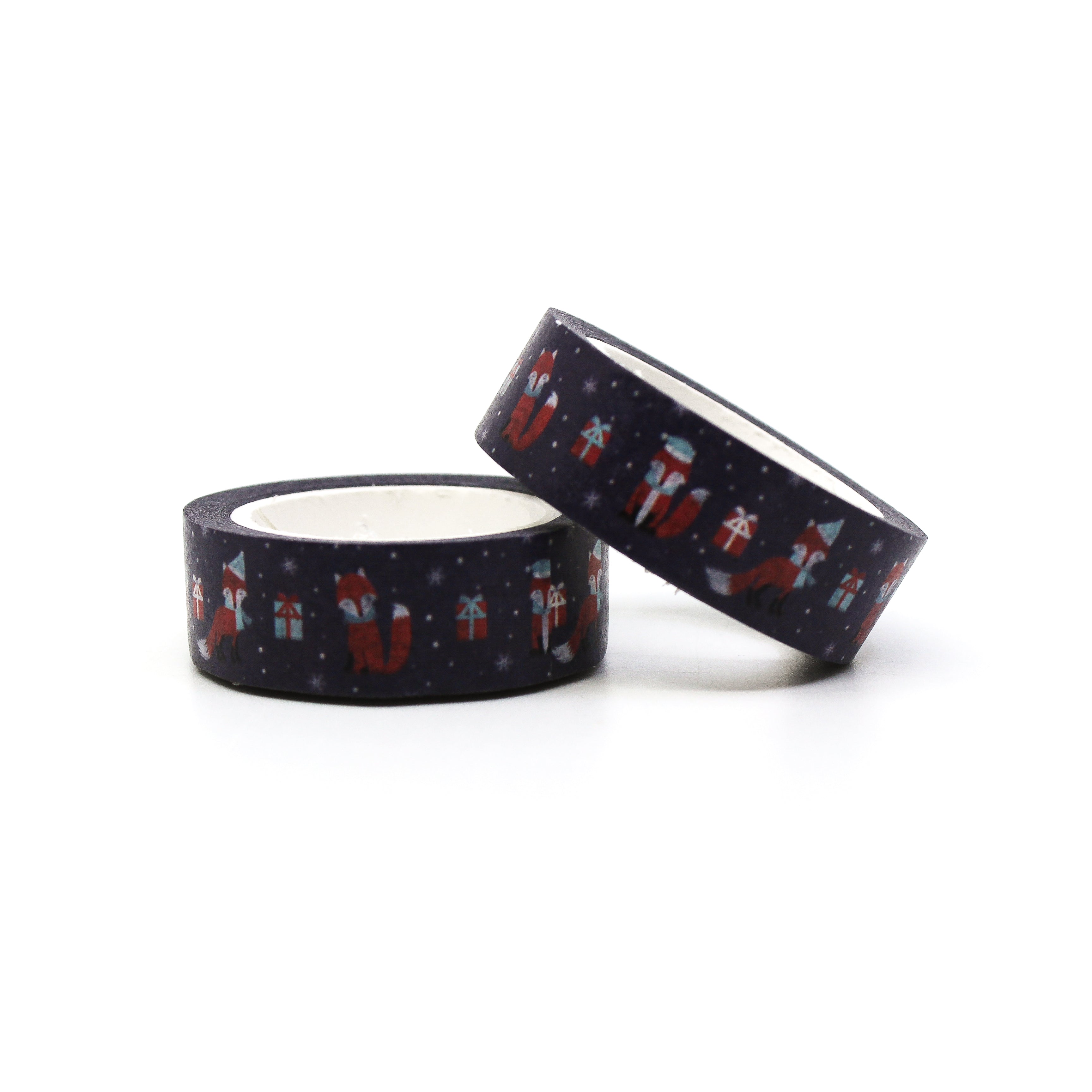 This is a photo of two navy blue and red fox washi tapes stacked. The fox is wearing a hat and scarf with a Christmas gift from BBB Supplies Journaling and Washi Craft Supply Shop.