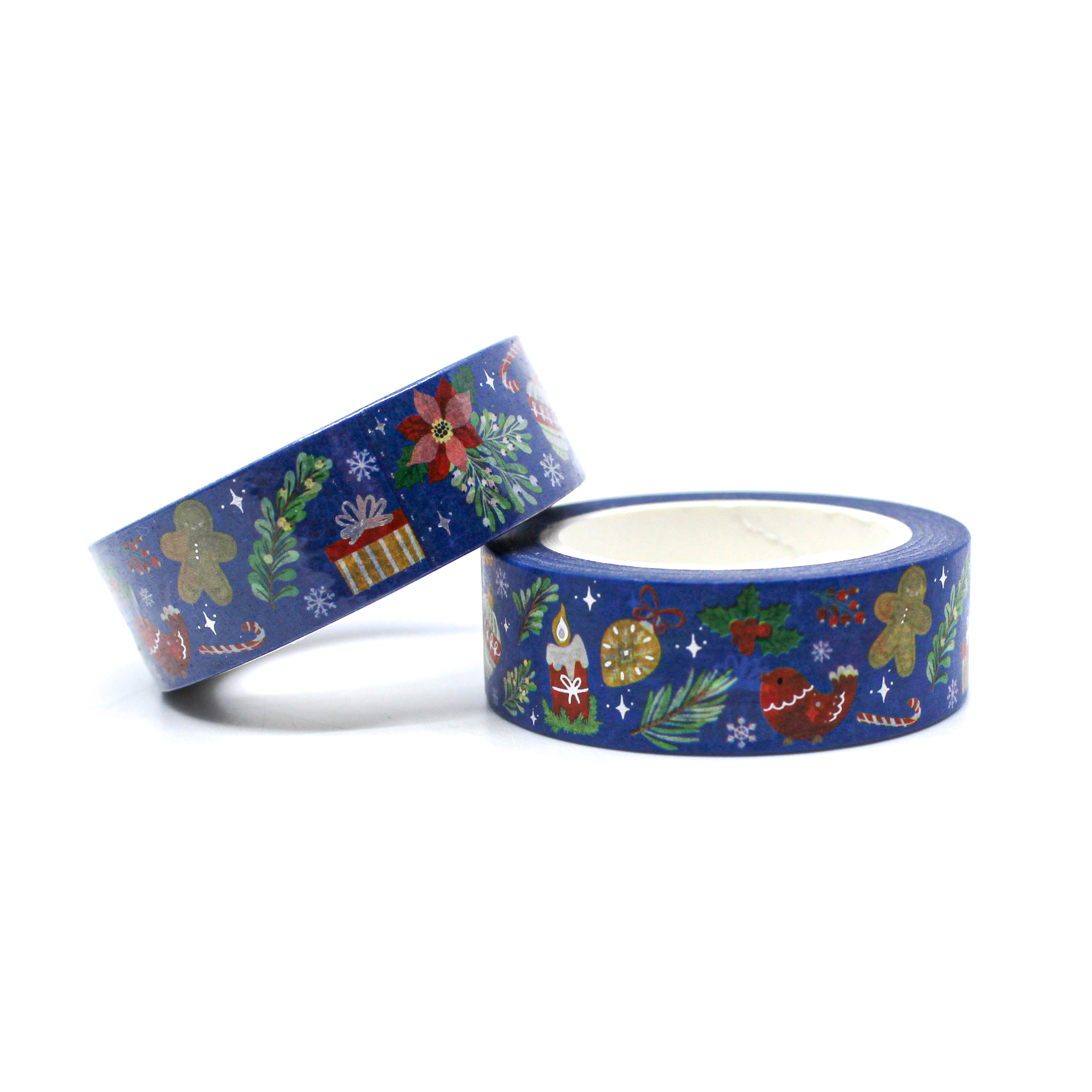 This is a washi tape with many joyful symbols including gingerbread man, holiday and presents, candle and ornaments Christmas Tape from BBB Supplies Craft and Washi Tape Shop.