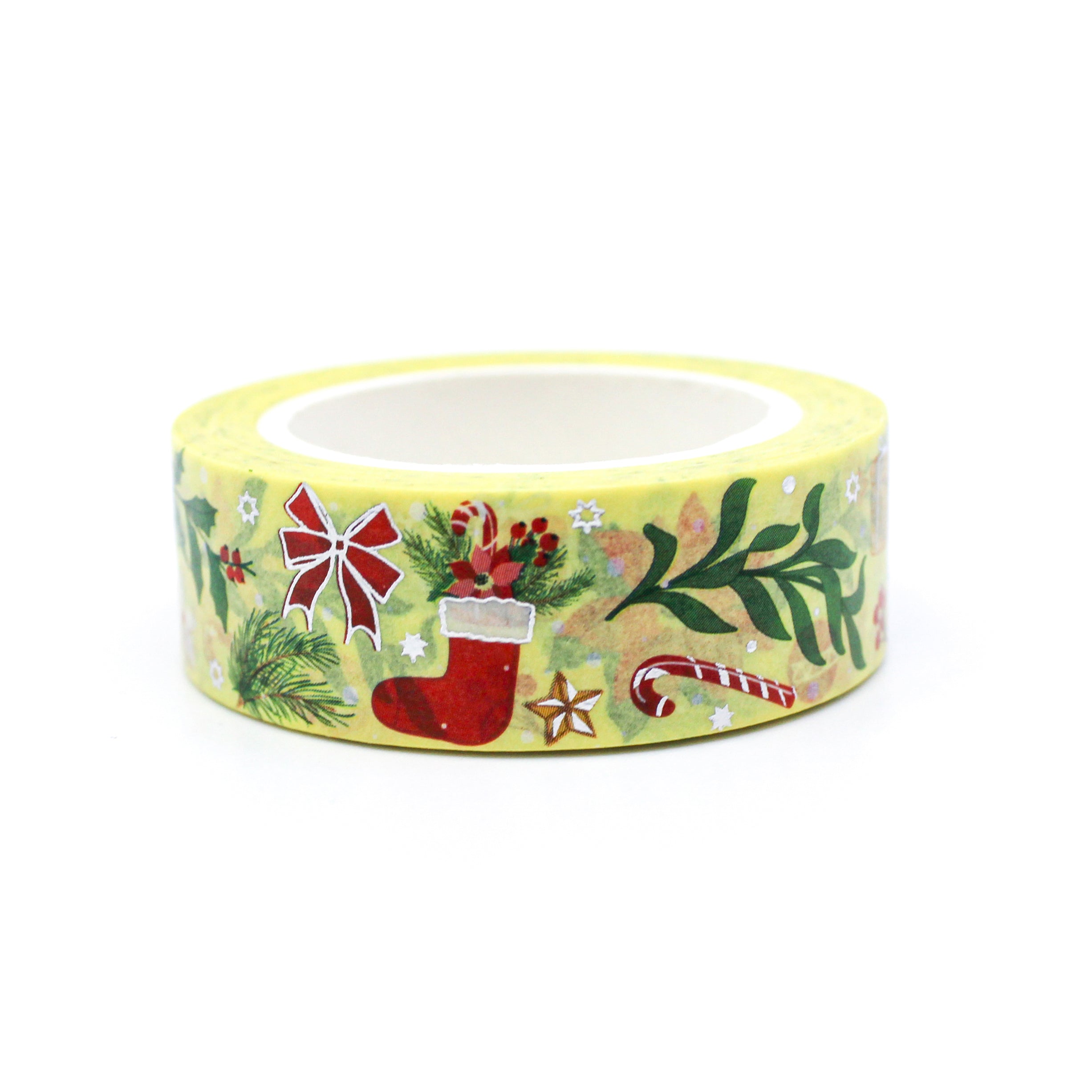 This is a warm yellow Holiday tape with silver foil accents that includes symbols of Stockings, Candy Canes, Poinsettias, and holiday foliage. 