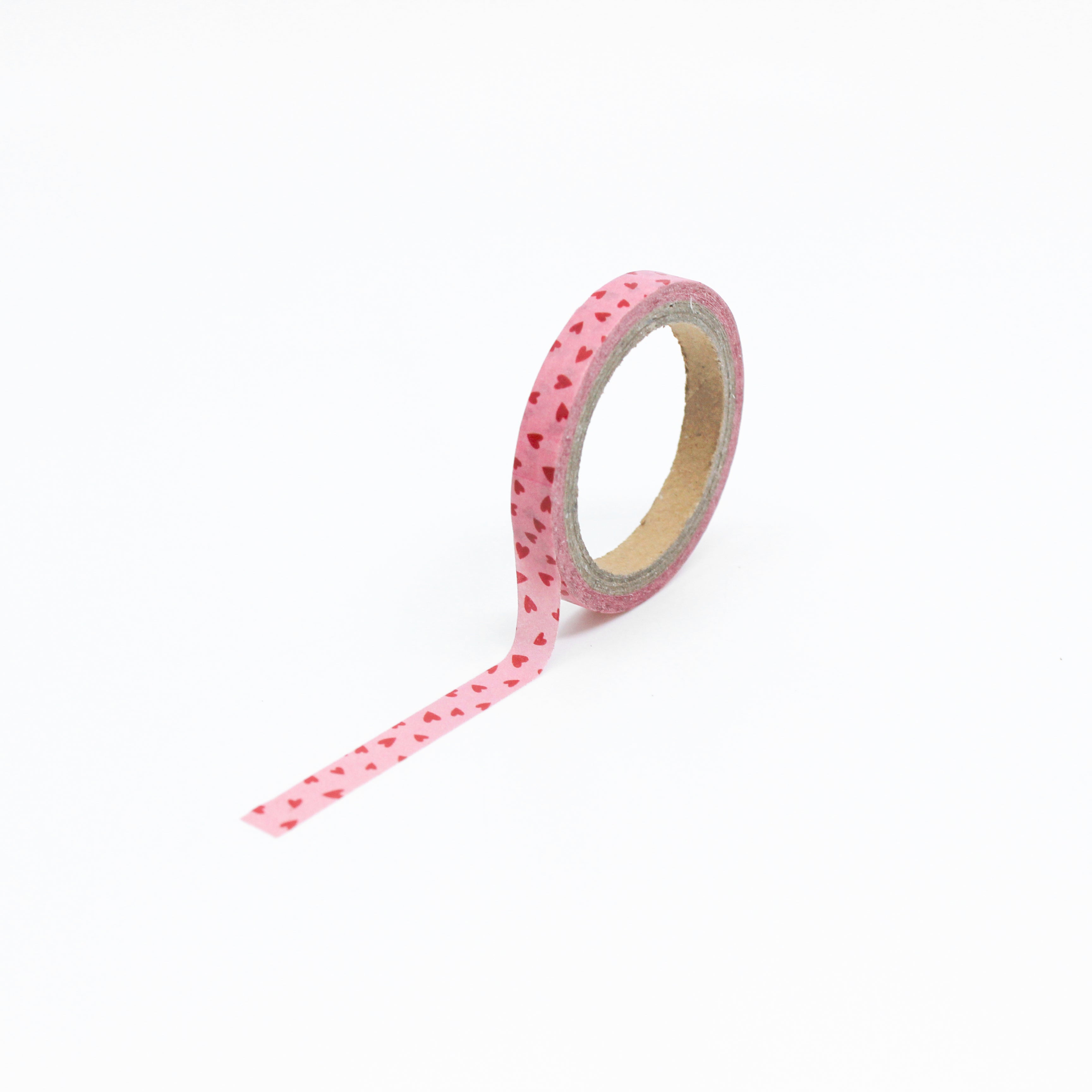 This is a full pattern repeat view of a Valentine pink background red hearts themed washi tape from BBB Supplies Craft Shop