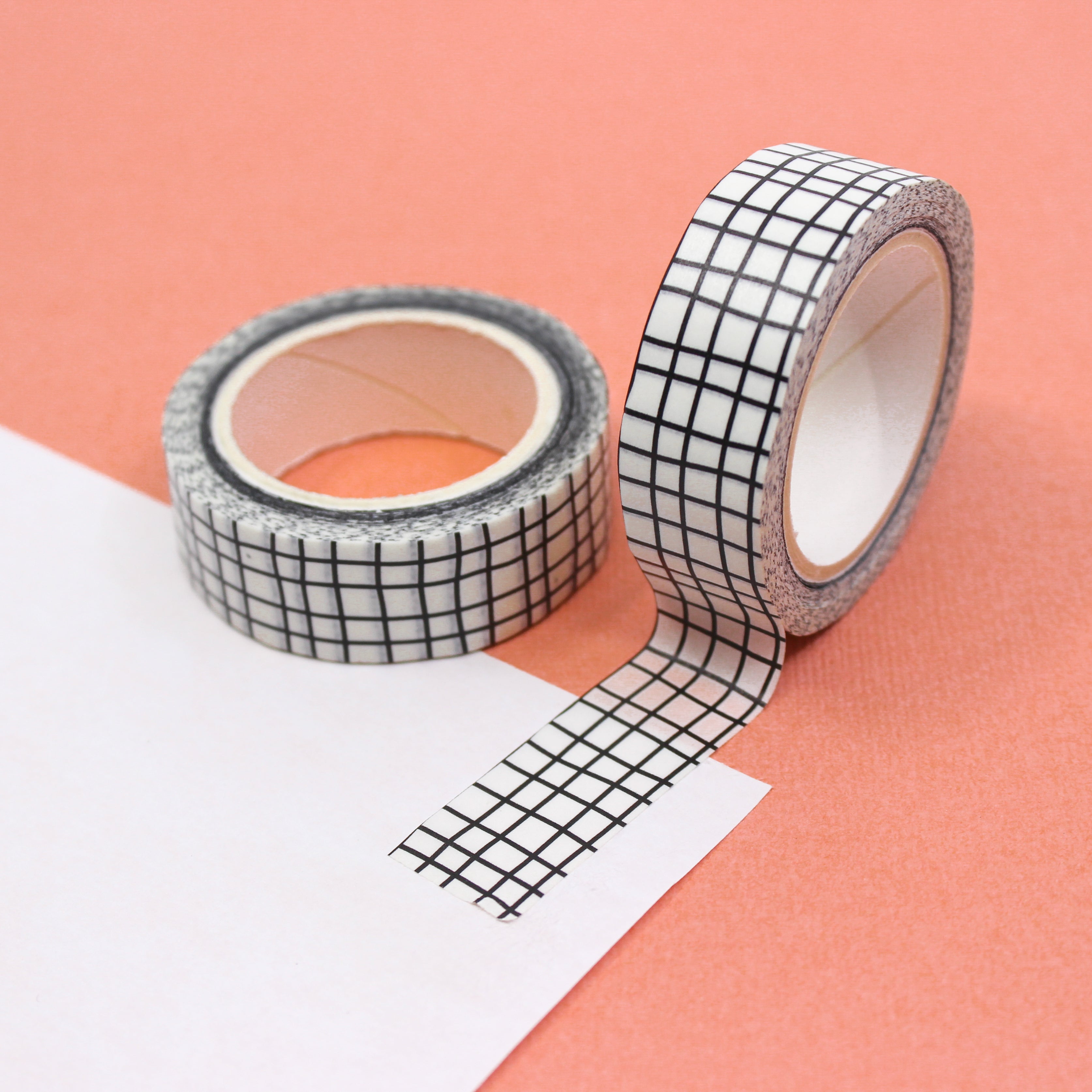 This is a white modern grid pattern view themed washi tape from BBB Supplies Craft Shop
