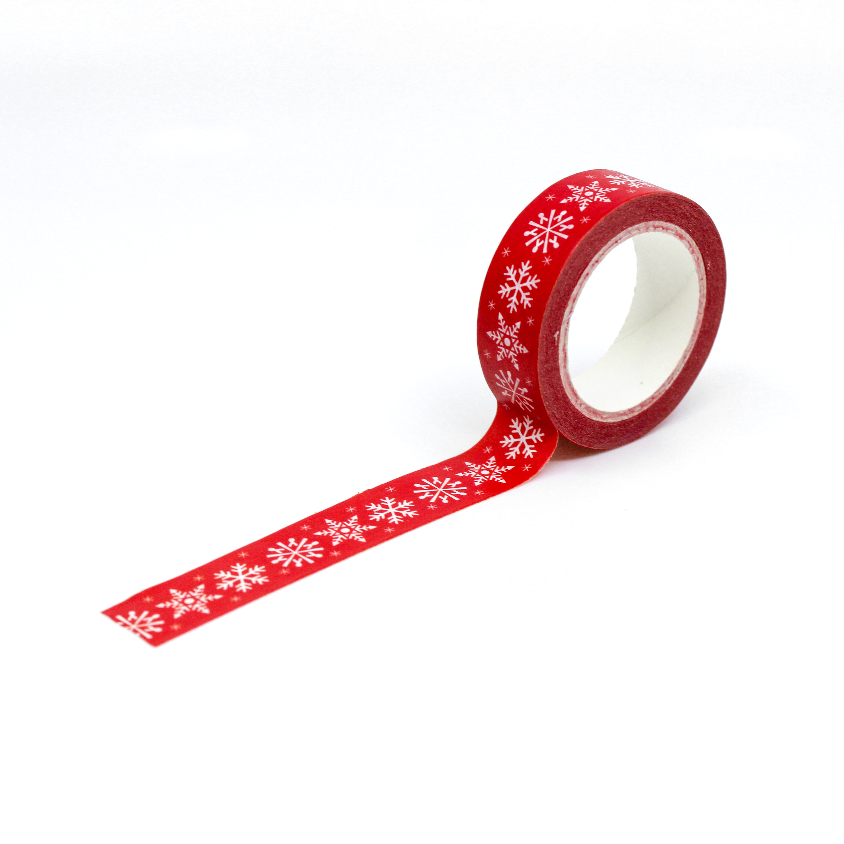 This is a full pattern repeat view of red snow flakes washi tape from BBB Supplies Craft Shop