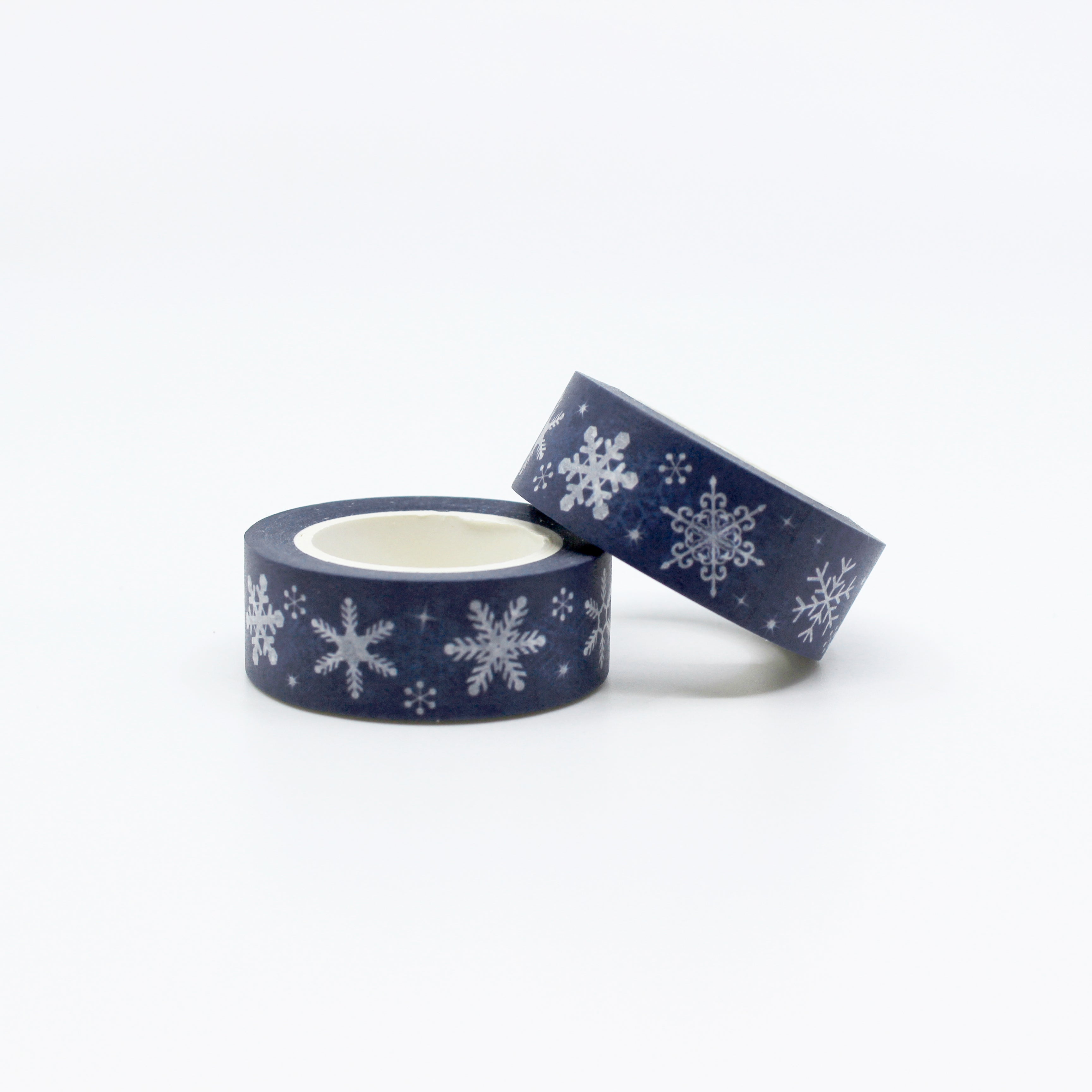 This is a roll of dark blue and white snowflakes washi tapes from BBB Supplies Craft Shop