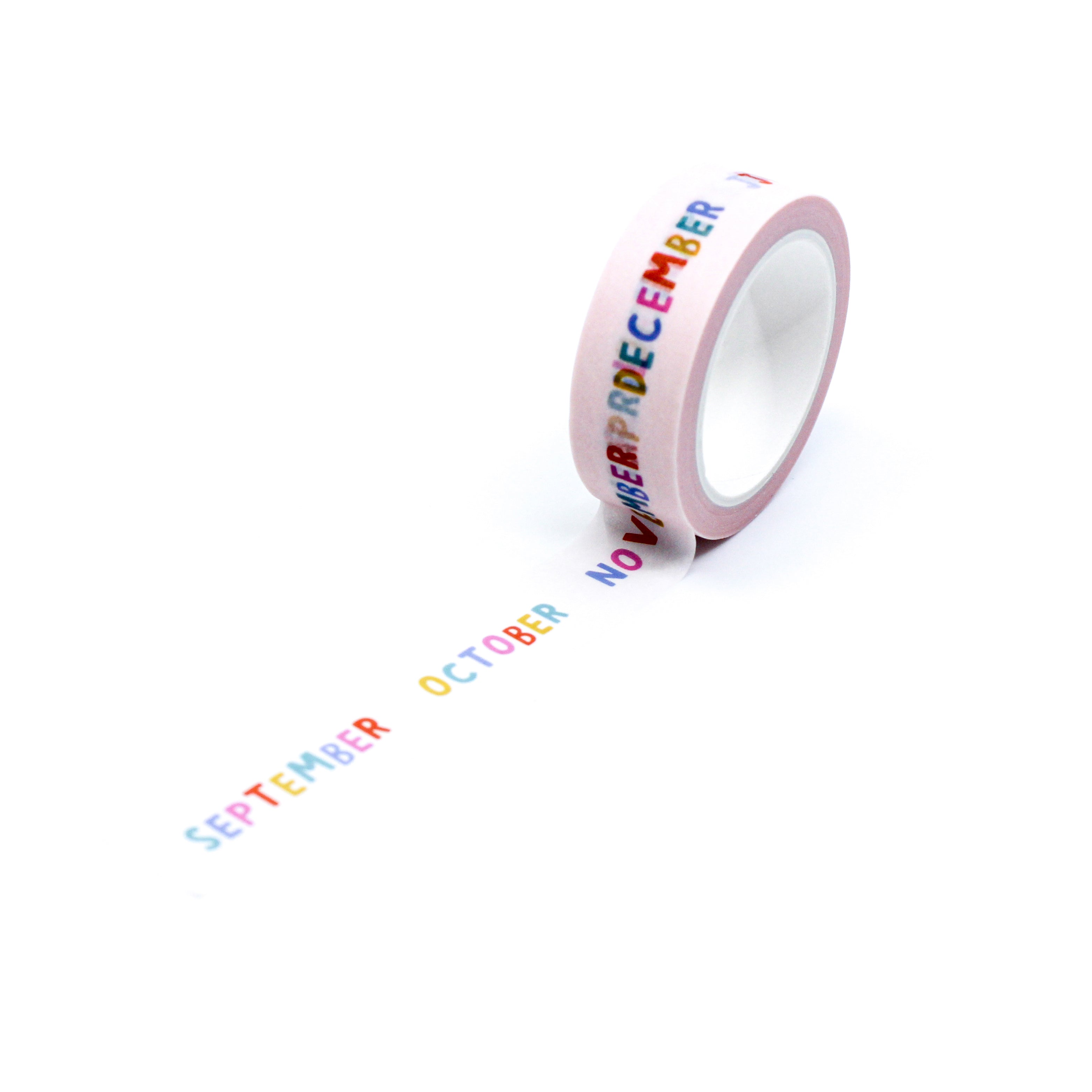 This is a full pattern repeat view of colorful lettering of each month with white background themed washi tape from BBB Supplies Craft Shop