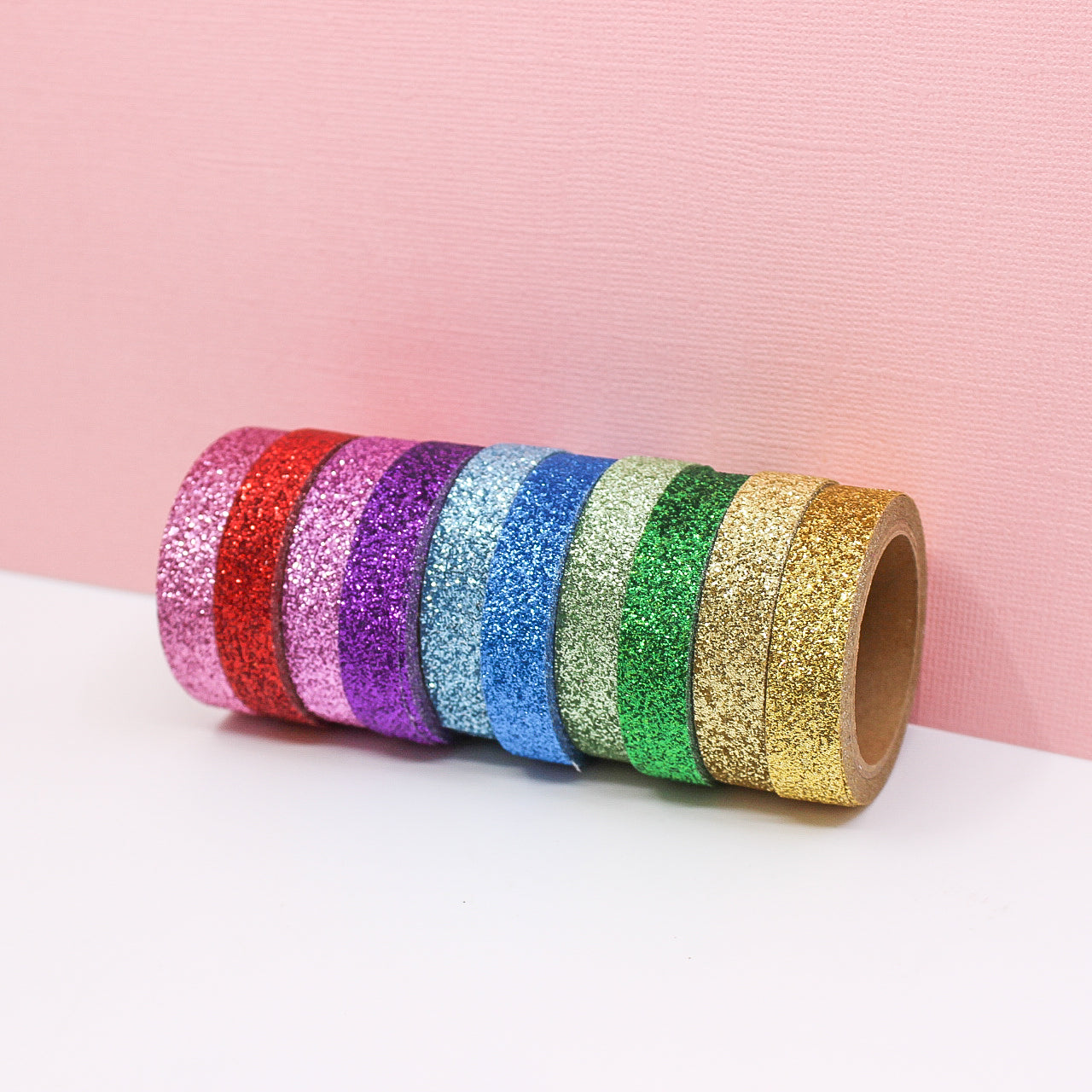 This set of washi tape is perfect for multiple projects. The set includes pastel and primary red, blue, yellow, green, blue, and purple glitter tapes. This tape will add some sparkle to any project. This set is sold at BBB Supplies Craft Shop.