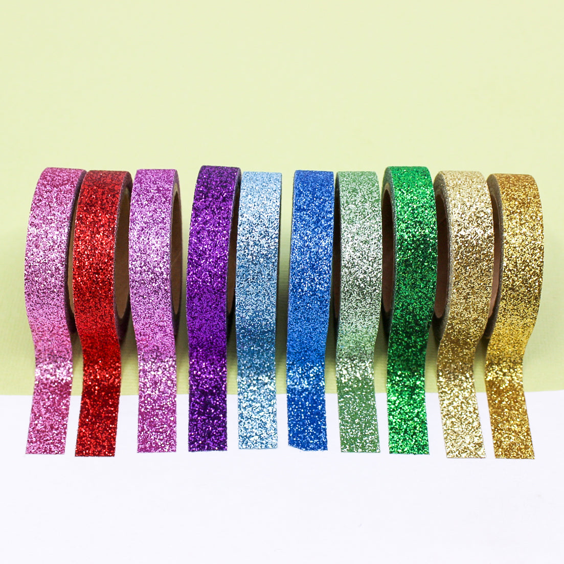 This set of washi tape is perfect for multiple projects. The set includes pastel and primary red, blue, yellow, green, blue, and purple glitter tapes. This tape will add some sparkle to any project. This set is sold at BBB Supplies Craft Shop.