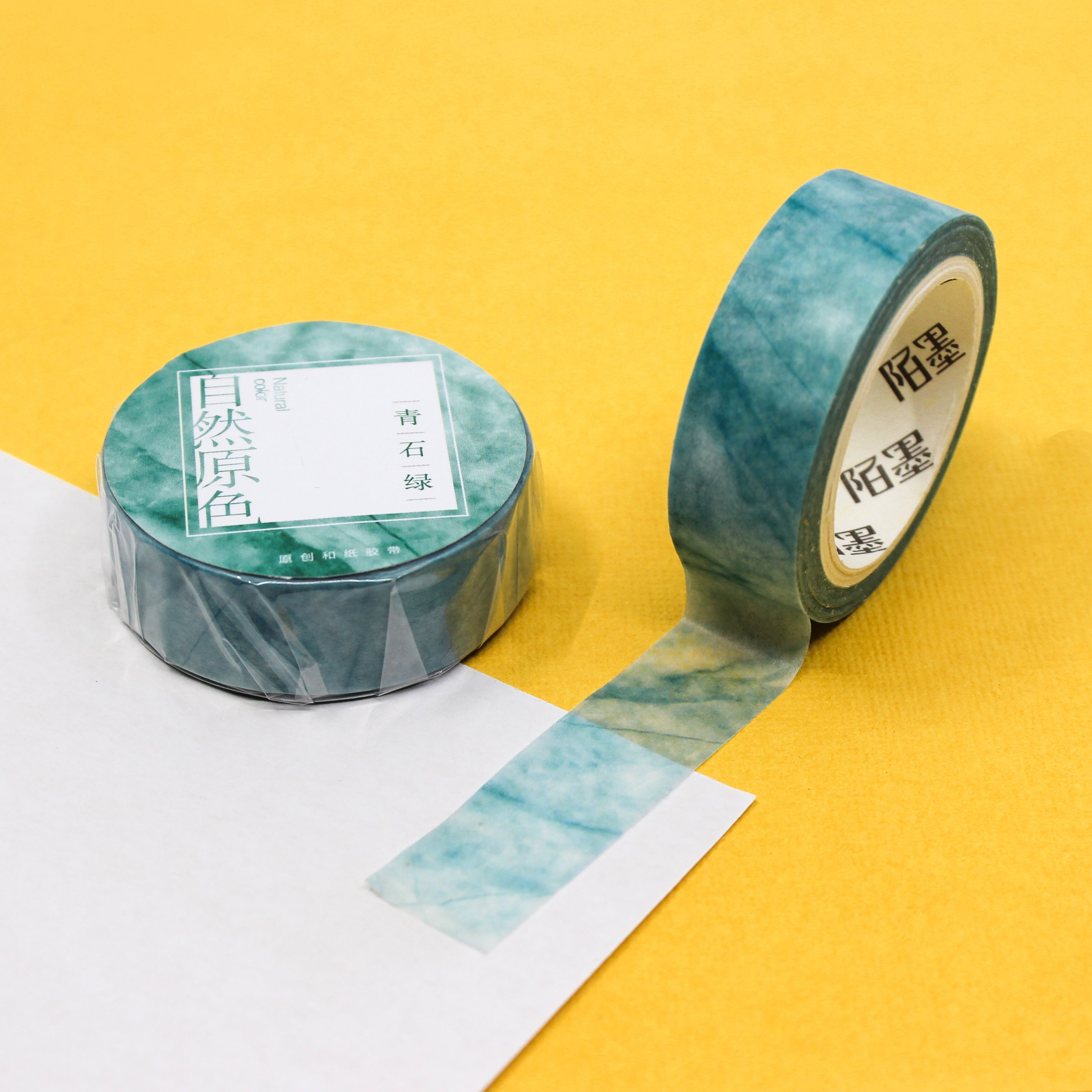 This green crystal mountain watercolor washi tape is the perfect addition to your washi collection. The simplicity of the pattern is perfect for accenting and matching any project's theme while adding a beautiful and interesting pattern. This tape is sold at BBB Supplies Craft Shop