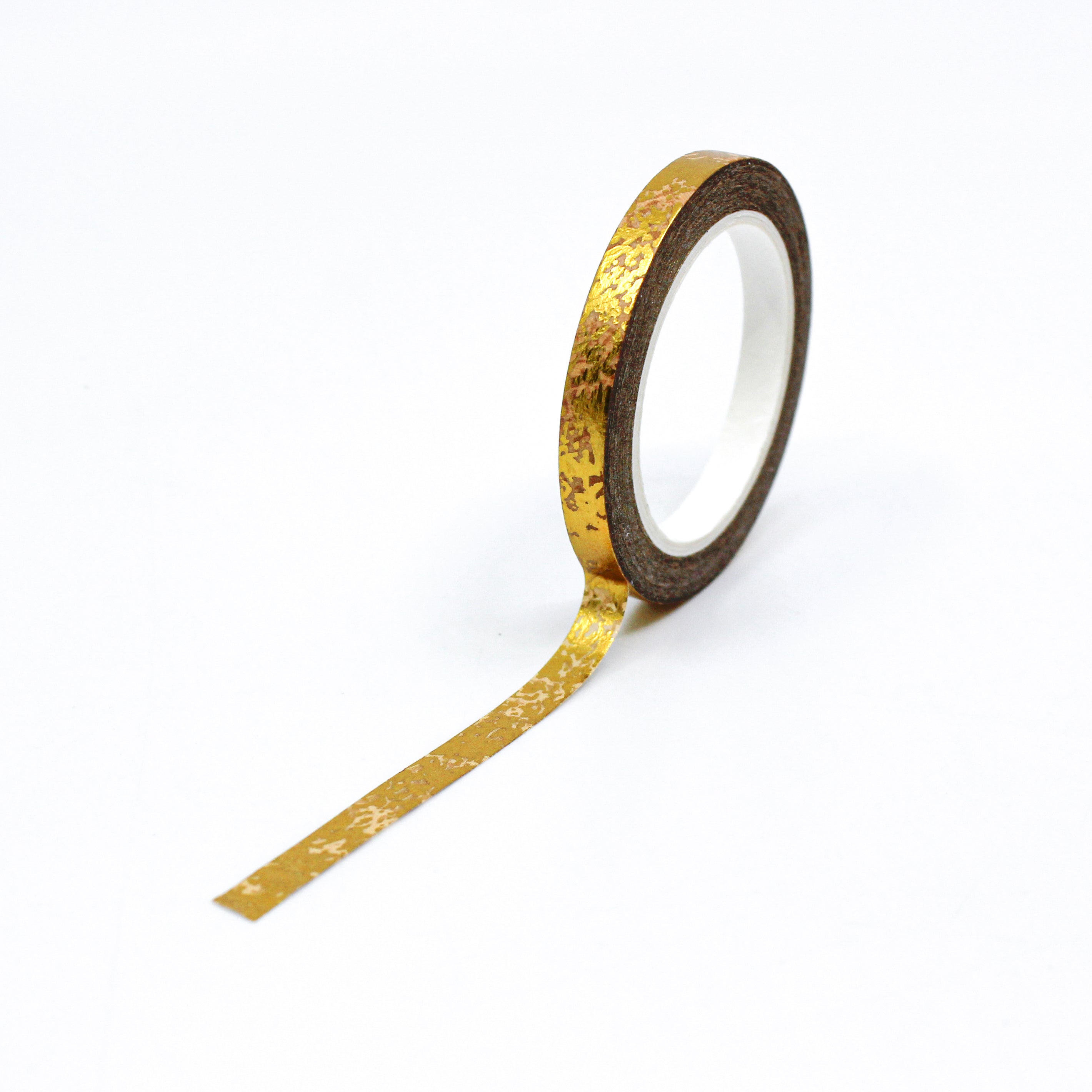 This is a full pattern repeat view of matte gold thin foil washi tape from BBB Supplies Craft Shop