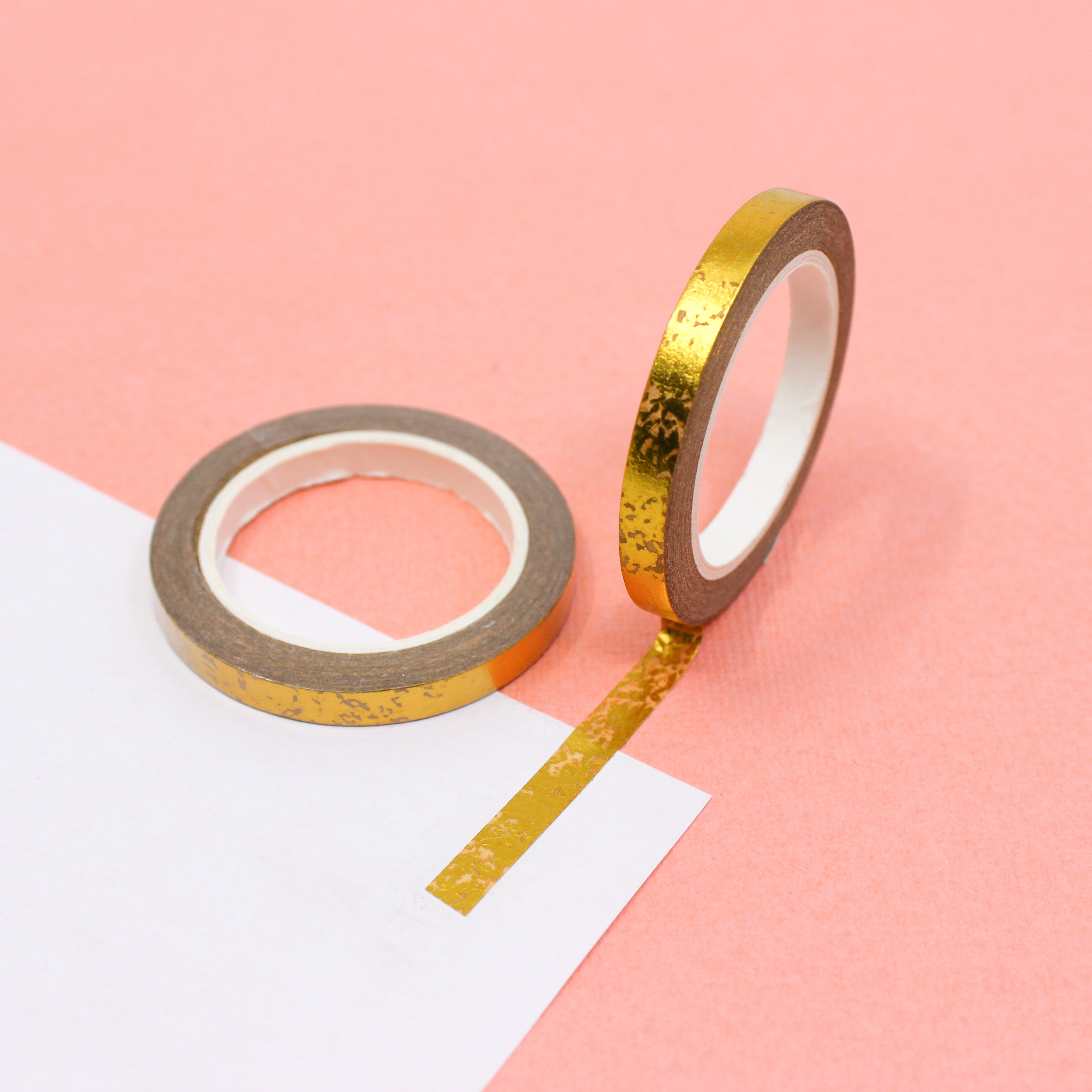 This is a matte gold thin foil pattern washi tape from BBB Supplies Craft Shop