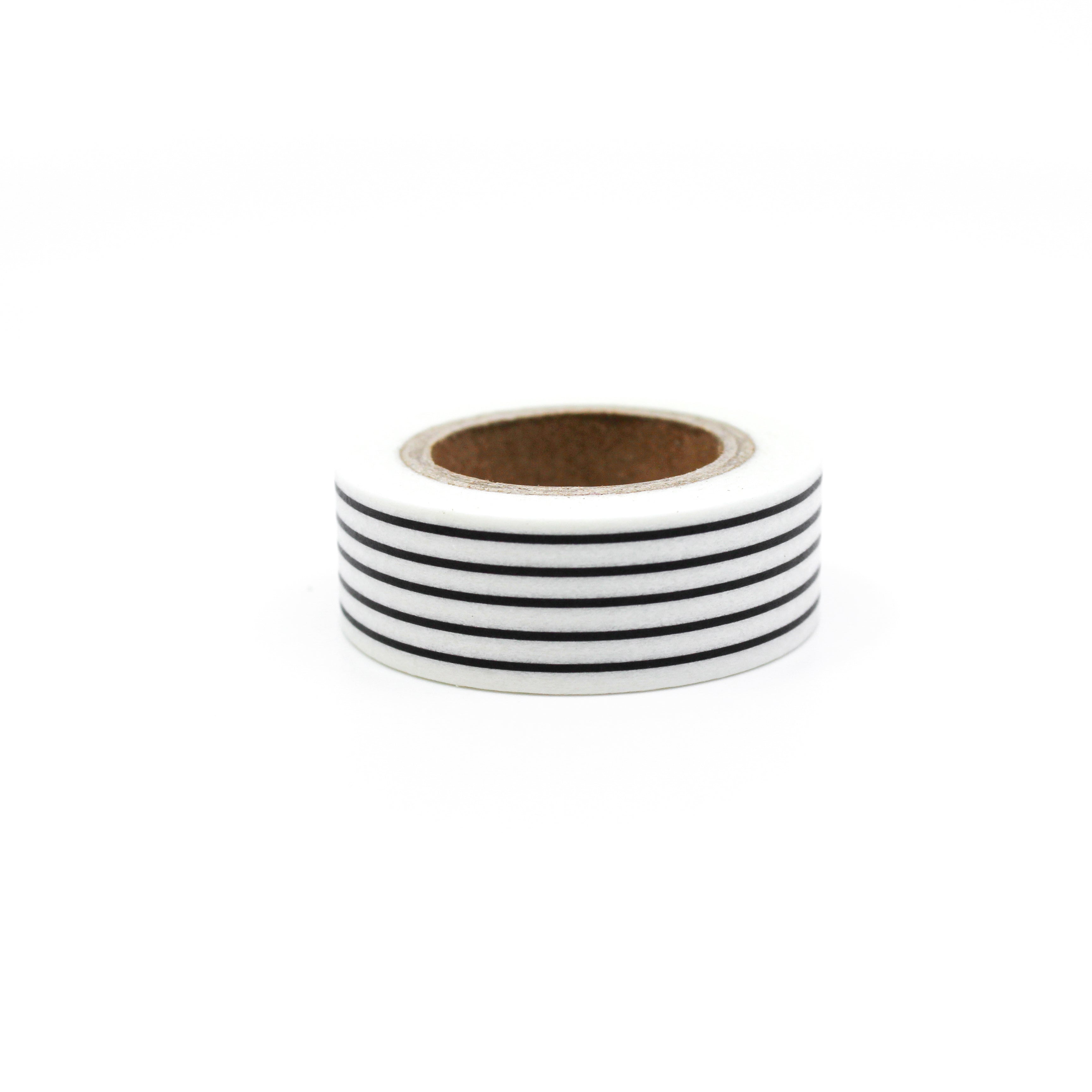 This is a thin black stripe on a white background pattern washi tape from BBB Supplies Craft Shop
