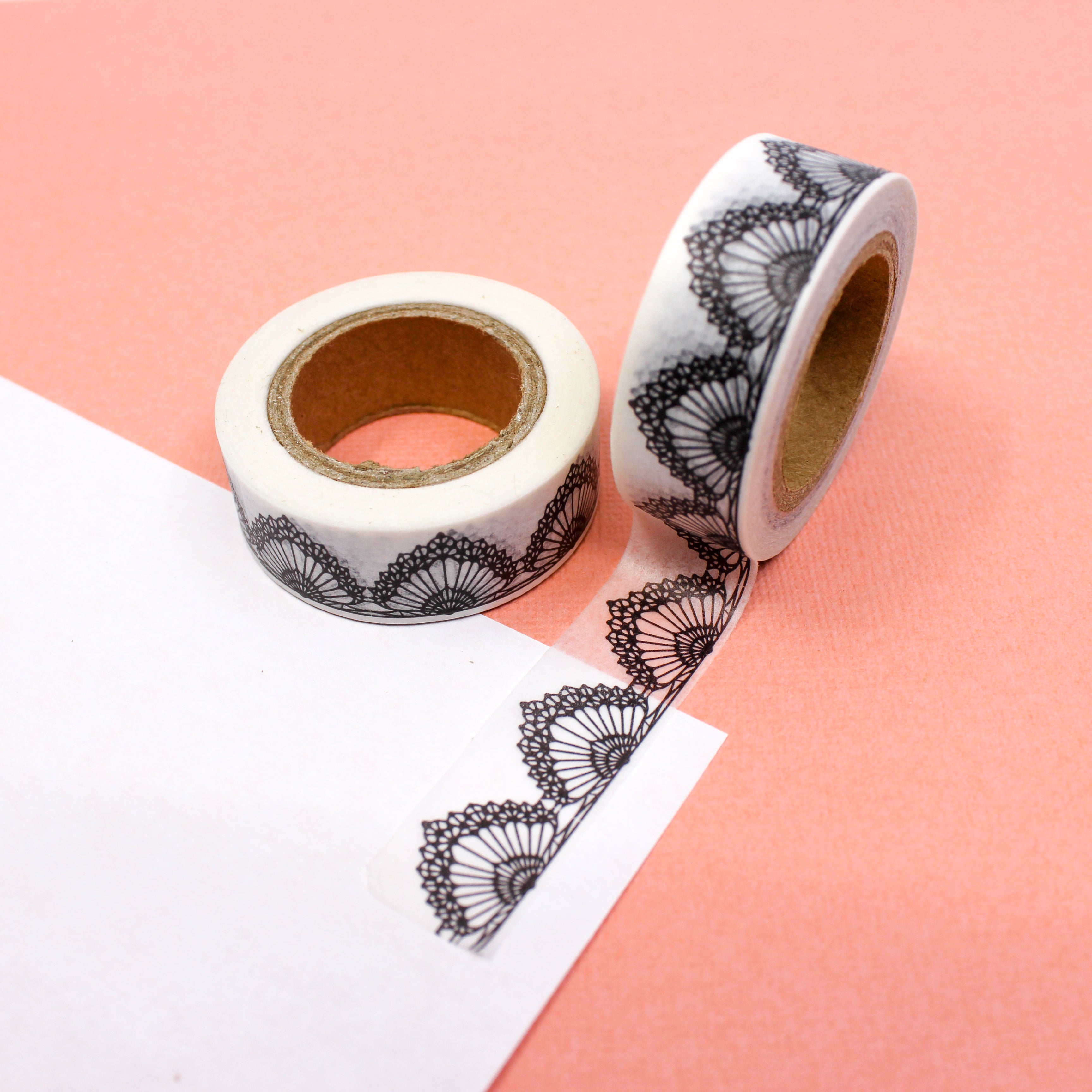 This is a whimsical black and white lace flag scallop pattern Washi Tape from BBB Supplies Craft Shop