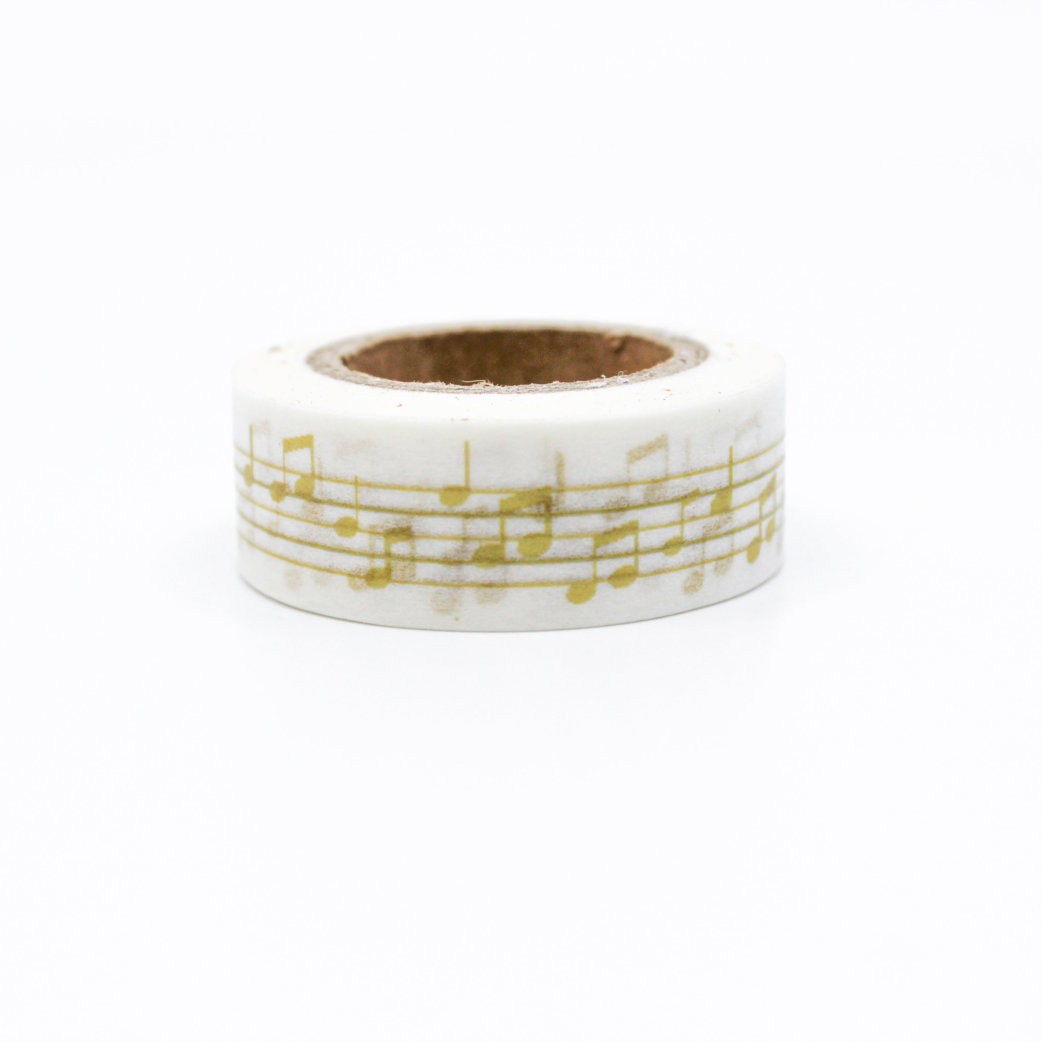 This is a yellow music note in a white background washi tape from BBB Supplies Craft Shop