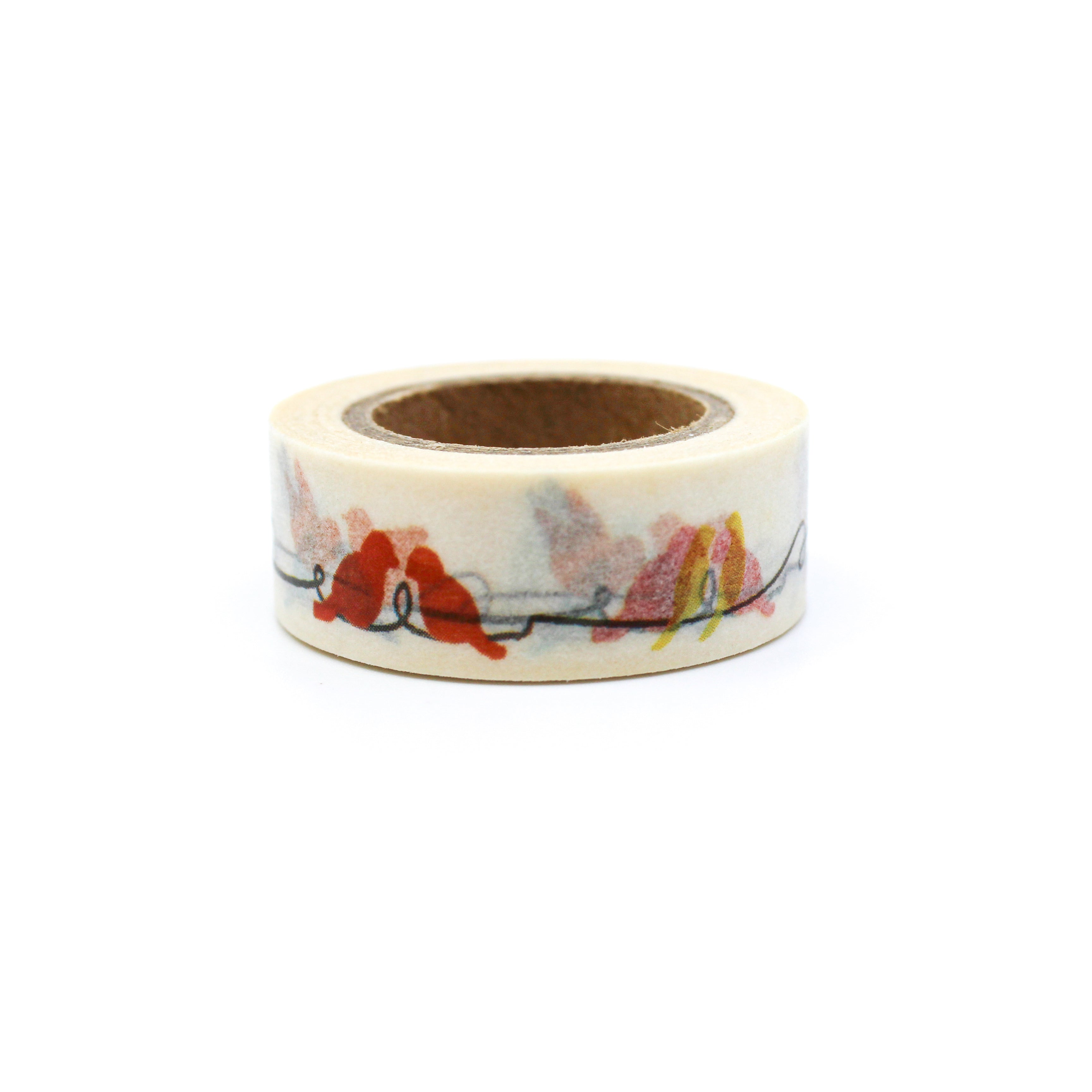 This is a variety of color birds on top of a wire in a white background washi tape from BBB Supplies Craft Shop