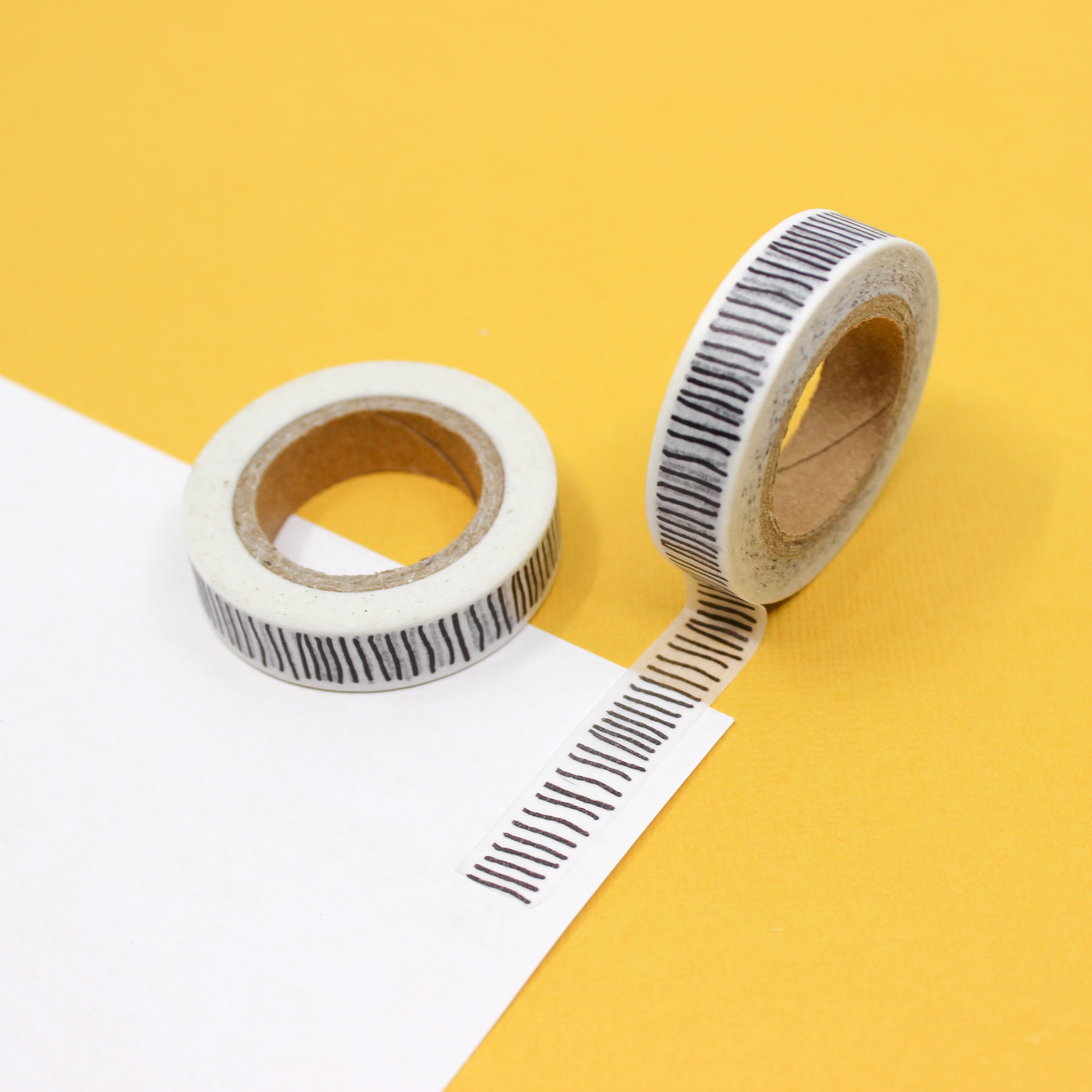 This is a black stick lines pattern washi tape from BBB Supplies Craft Shop