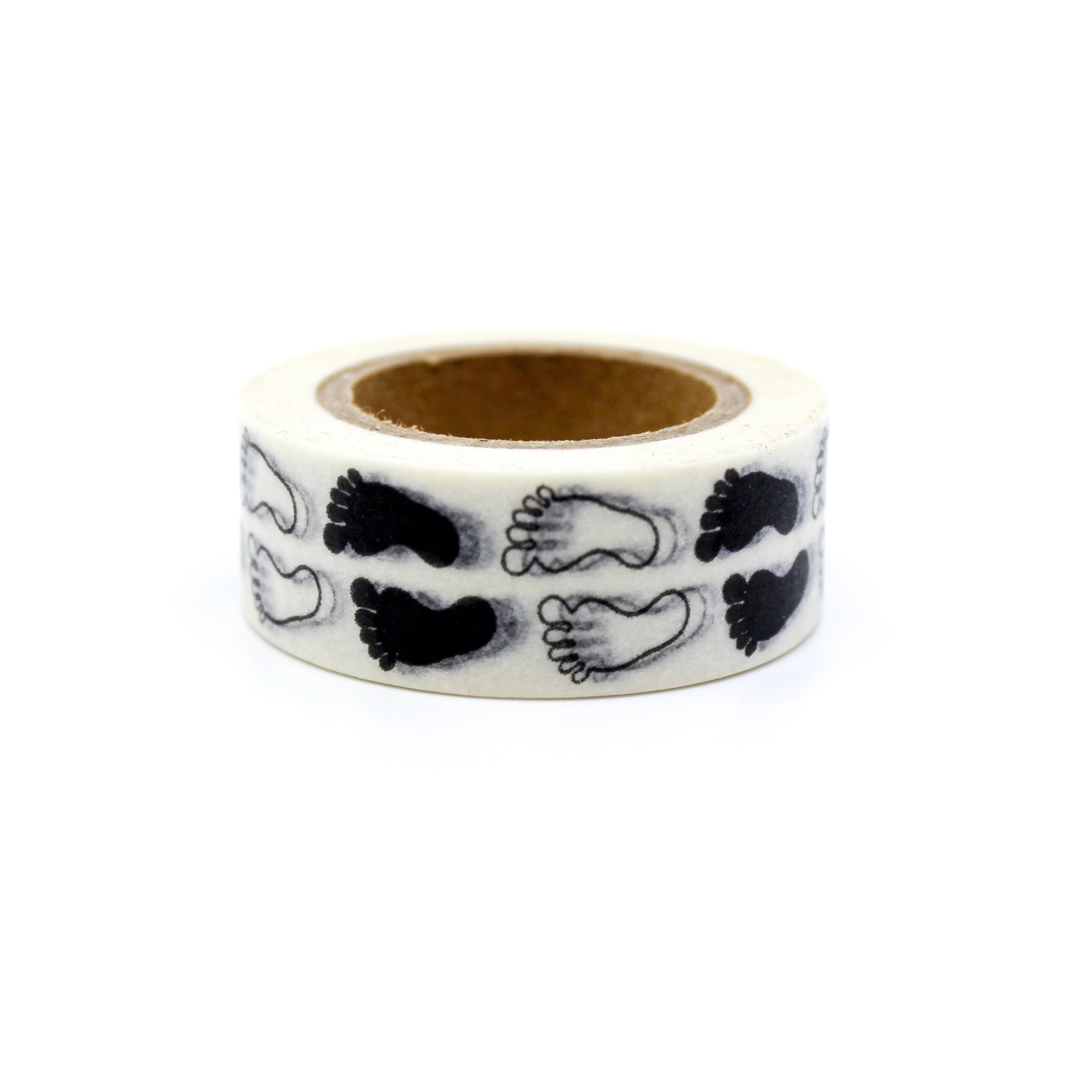 This is a black and white foot prints pattern washi tape from BBB Supplies Craft Shop