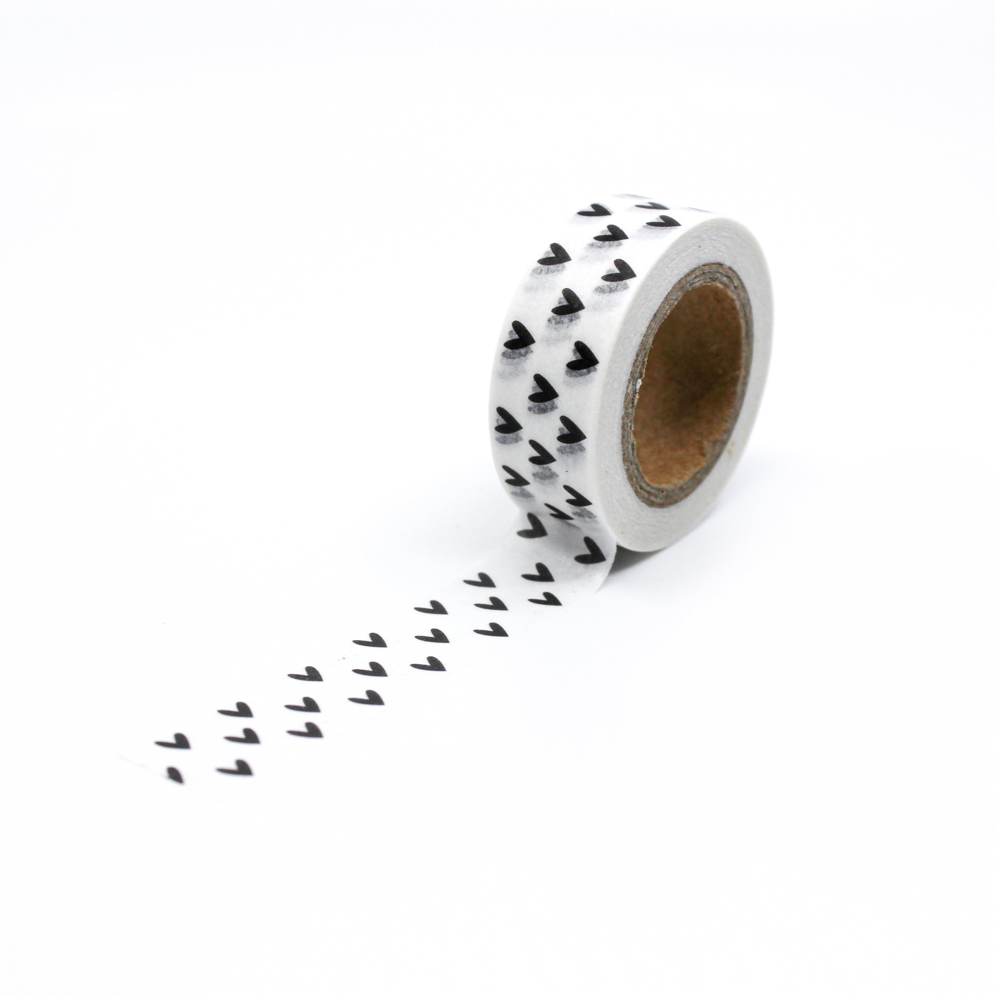 This is a full pattern repeat view of black and white little hearts washi tape from BBB Supplies Craft Shop