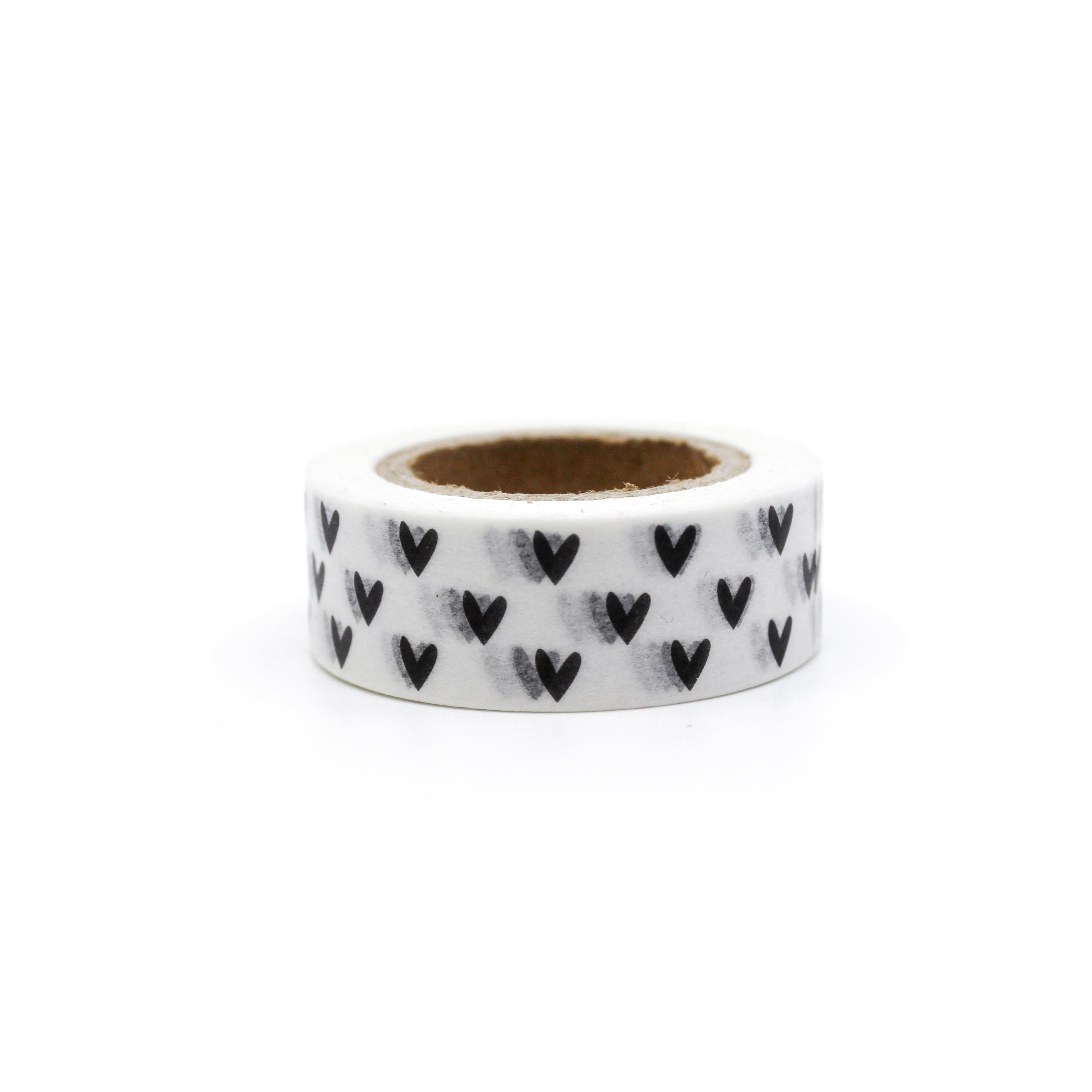 This is a black modern tiny hearts in a white background washi tape from BBB Supplies Craft Shop